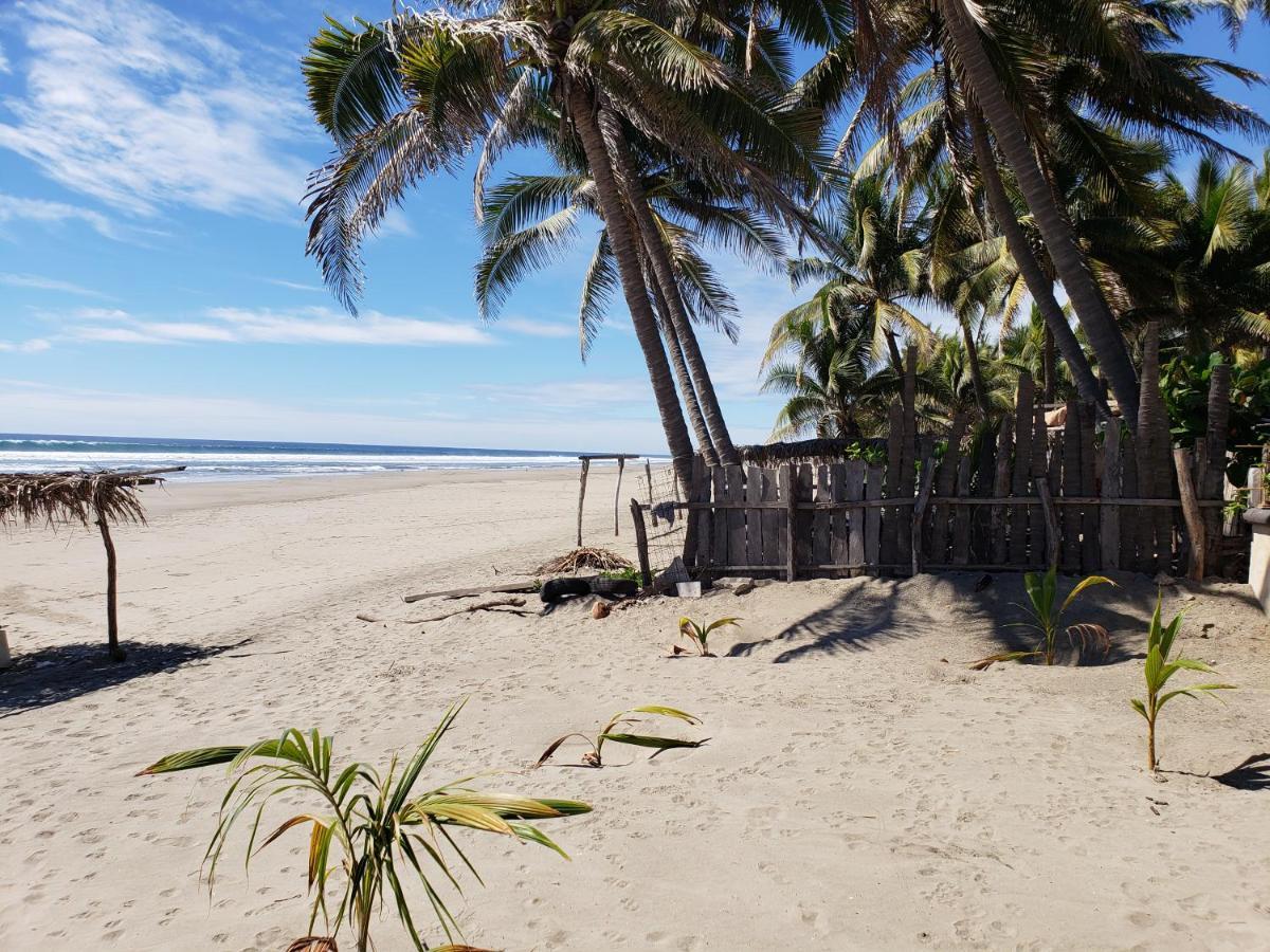 Bungalows La Perla Playa Azul Exterior photo